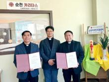 Fr. Peter Kim Jun Oh, in-charge of the Suncheon Catholic Migrant Center, with Fr. Balqin and Fr. Cuong.