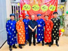 Mons. Anthony Vu, Bishop emeritus of Dalat, with the Rogationist seminarians in the traditional local costume.