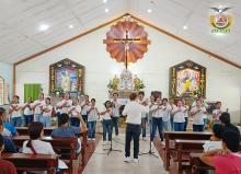 St. John Paul II Parish Chorale rendering songs to Father General.