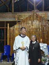 Sister Yulita, FDZ with Fr. Orville RCJ.