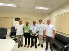 Cardinal John Ribat, DD, KBE, MSC, Dr. Oti Jigu and Fr. Justine Ninat, SVD, the current school director, Padri Arreza e Conson.