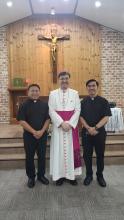 Archbishop Simon Ok with Fr. Noel Balquin and Fr. Joseph Cuong who work for the Migrant Ministry in Suncheon.