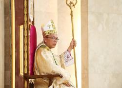 Mons. Herman Abcede RCJ, seated on the cathedra assuming the role as the 5th bishop of the Diocese of Daet