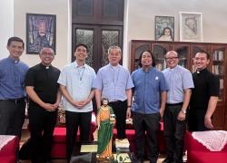 Archbishop Joseph Nang of Saigon receiving the SMP Provincial and his delegation.